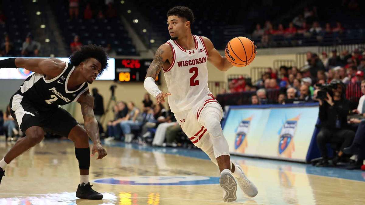 Wisconsin Badgers guard Nick Boyd (2) handles the ball against Providence Friars guard Jaylin Sellers (2) during the second half at Jenny Craig Pavilion.