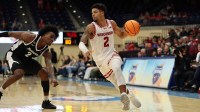Wisconsin Badgers guard Nick Boyd (2) handles the ball against Providence Friars guard Jaylin Sellers (2) during the second half at Jenny Craig Pavilion.