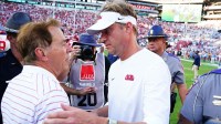 Alabama Crimson Tide head coach Nick Saban greets Mississippi Rebels head coach Lane Kiffin midfield after Alabama defeated the Rebels 24-10 at Bryant-Denny Stadium.