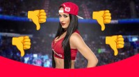 WWE Superstar Nikki Bella with thumbs down emojis.