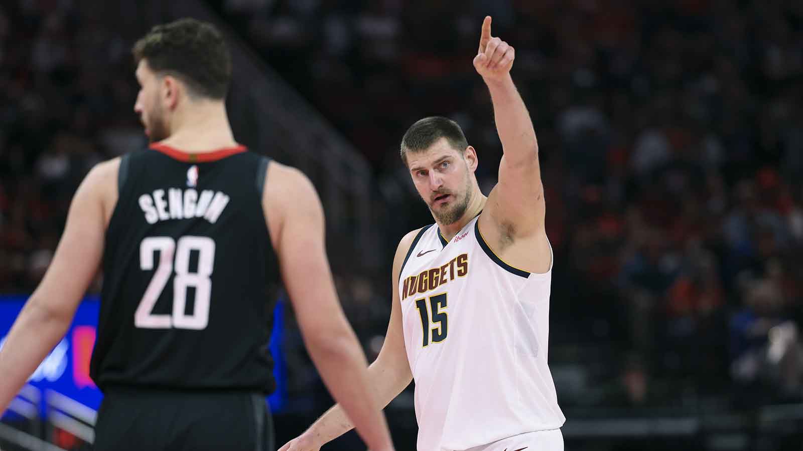 Denver Nuggets center Nikola Jokic (15) points during the fourth quarter against the Houston Rockets at Toyota Center.