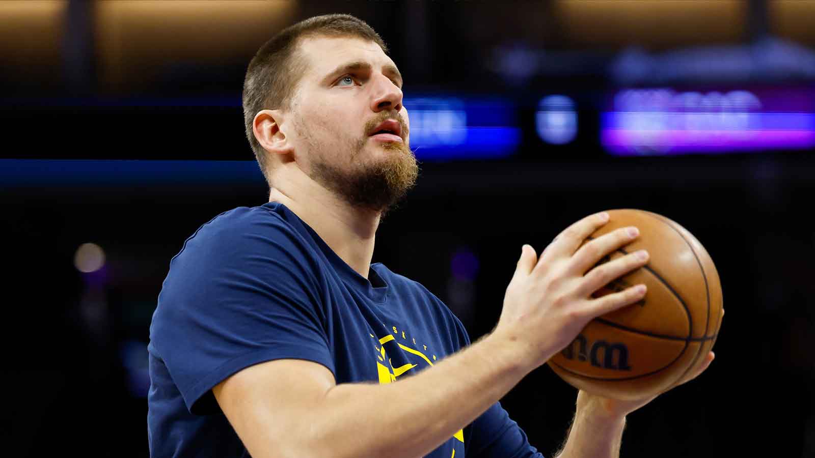 Denver Nuggets center Nikola Jokic (15) warms up before the game against the Sacramento Kings at Golden 1 Center.