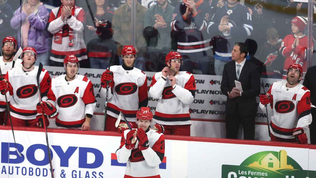 Carolina Hurricanes left wing Nikolaj Ehlers (27) acknowledges fans on his first game back against the Winnipeg Jets at Canada Life Centre.