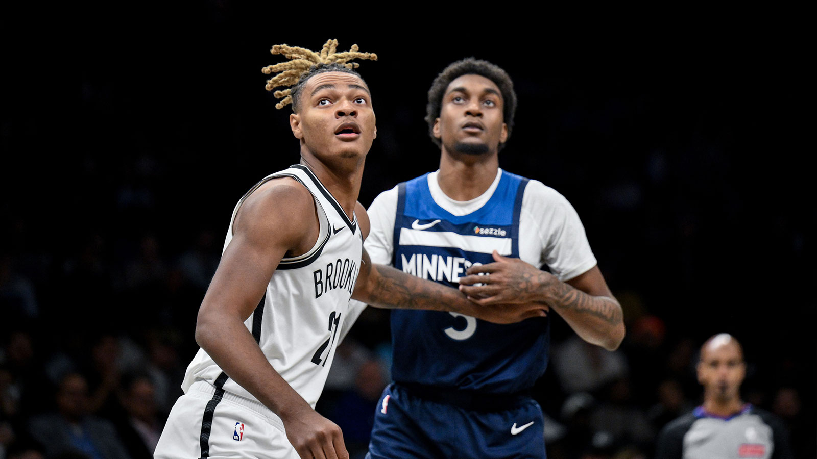 Brooklyn Nets forward Noah Clowney (21) boxes out against Minnesota Timberwolves forward Jaden McDaniels (3) during the first half at Barclays Center.