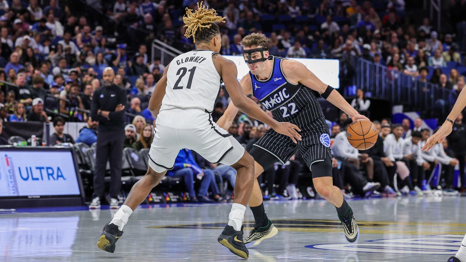 Brooklyn Nets forward Noah Clowney (21) defends Orlando Magic forward Franz Wagner (22) during the second half at Kia Center.