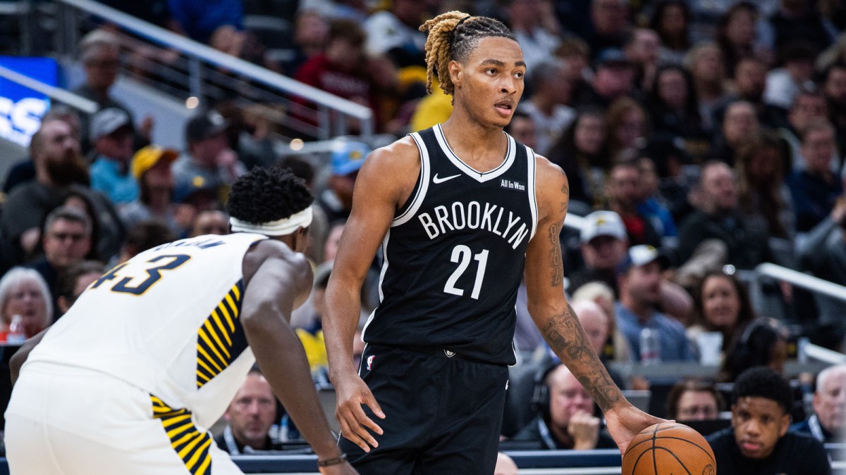 Brooklyn Nets forward/center Noah Clowney (21) dribbles the ball while Indiana Pacers forward Pascal Siakam (43) defends in the second half at Gainbridge Fieldhouse.