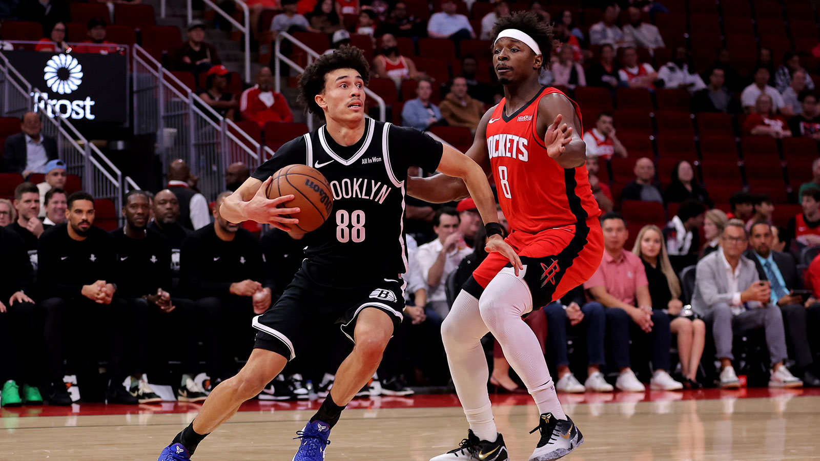 Brooklyn Nets guard Nolan Traore (88) drives to the basket against Houston Rockets forward Jae'Sean Tate (8) during the fourth quarter at Toyota Center.