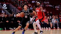Brooklyn Nets guard Nolan Traore (88) drives to the basket against Houston Rockets forward Jae'Sean Tate (8) during the fourth quarter at Toyota Center.