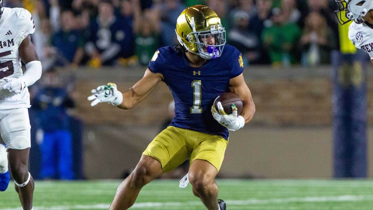 Notre Dame Fighting Irish wide receiver Jaden Greathouse (1) runs with the ball during the second half against the Texas A&M Aggies at Notre Dame Stadium.