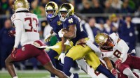 Notre Dame running back Jadarian Price (24) runs through the defense during a NCAA college football game against Florida State.