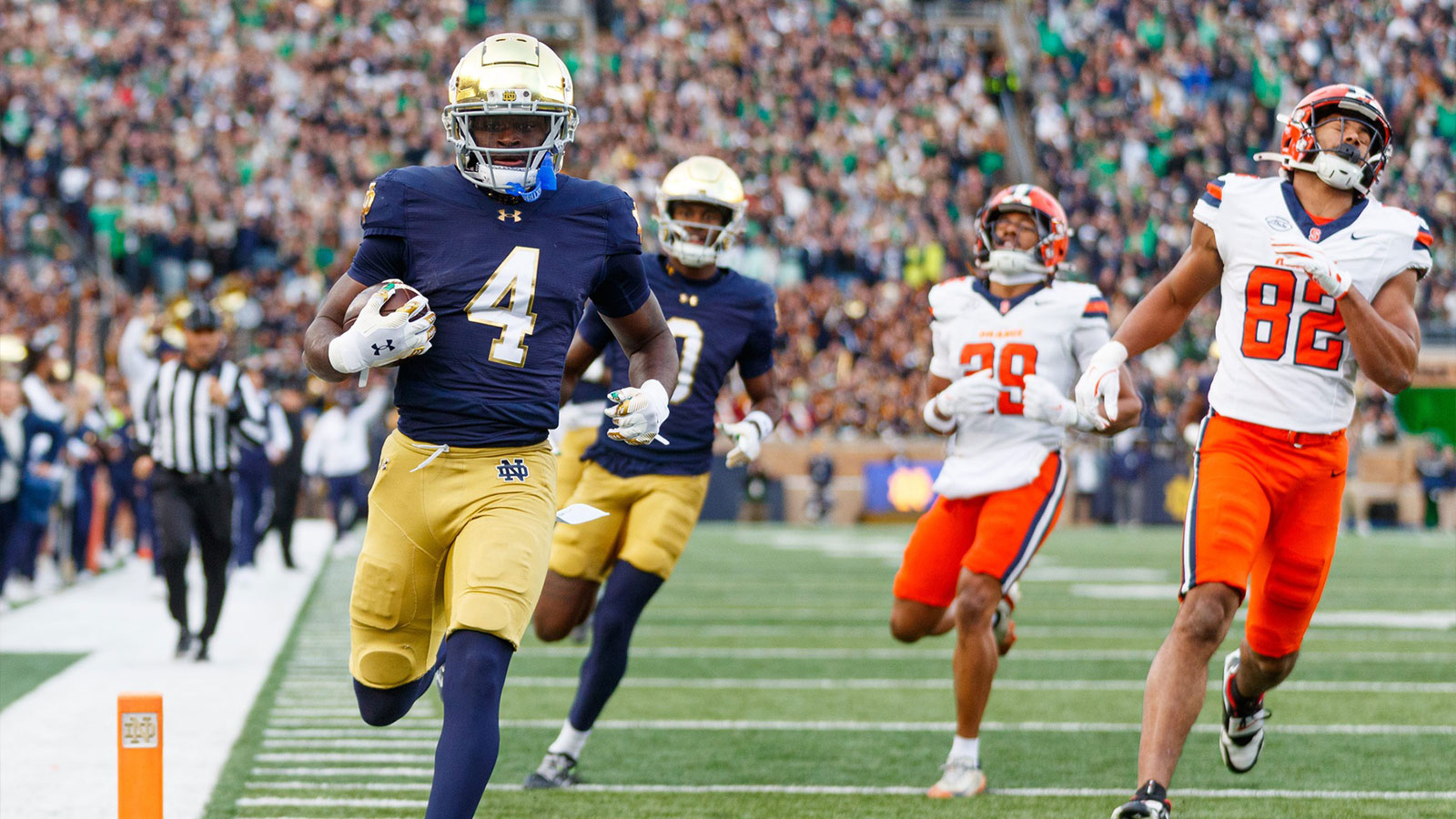 Notre Dame running back Jeremiyah Love (4) runs the ball into the end zone for a touchdown in the first half of a NCAA football game against Syracuse at Notre Dame Stadium on Saturday, Nov. 22, 2025, in South Bend.