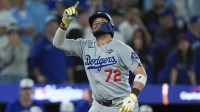 Los Angeles Dodgers second baseman Miguel Rojas (72) celebrates as he runs the bases after hitting a home run against the Toronto Blue Jays in the ninth inning during game seven of the 2025 MLB World Series at Rogers Centre. Mandatory Credit: John E. Sokolowski-Imagn Images