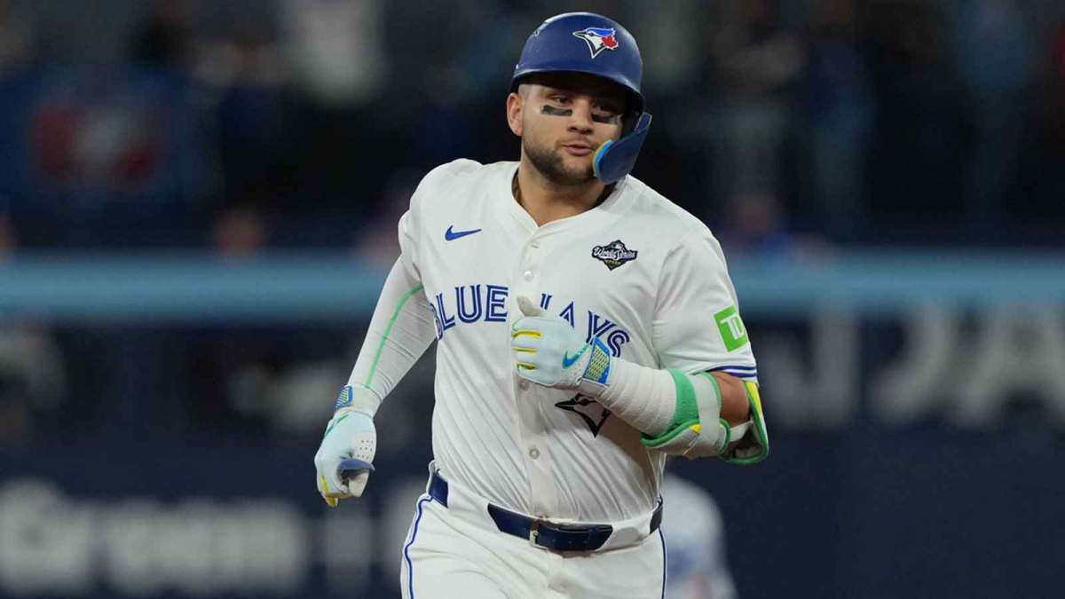 Toronto Blue Jays shortstop Bo Bichette (11) rounds the bases after hitting a three run home run against the Los Angeles Dodgers in the third inning for game seven of the 2025 MLB World Series at Rogers Centre. Mandatory Credit: Nick Turchiaro-Imagn Images