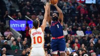 Nov 10, 2025; Inglewood, California, USA; Los Angeles Clippers guard James Harden (1) shoots against Atlanta Hawks forward Zaccharie Risacher (10) during the first half at Intuit Dome. Mandatory Credit: Gary A. Vasquez-Imagn Images