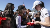 Nov 12, 2025; Belleair, Florida, USA; Indiana Fever guard Caitlin Clark (22) signs autographs for fans after the Annika Pro-Am golf tournament at Pelican Golf Club. Mandatory Credit: Nathan Ray Seebeck-Imagn Images