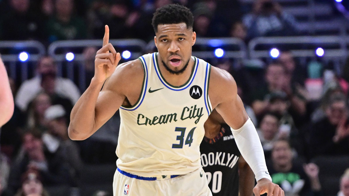 Milwaukee Bucks forward Giannis Antetokounmpo (34) reacts after scoring his 21,000th career point in the third quarter against the Brooklyn Nets at Fiserv Forum. Mandatory Credit: Benny Sieu-Imagn Images