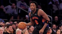 New York Knicks forward OG Anunoby (8) brings the ball up court against the Miami Heat during the first quarter at Madison Square Garden.