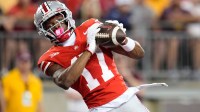 Ohio State Buckeyes wide receiver Carnell Tate (17) catches a touchdown pass during the first half of the NCAA football game against the Minnesota Golden Gophers at Ohio Stadium in Columbus on Oct. 4, 2025.
