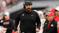 Ohio State Buckeyes head coach Ryan Day walks the sideline during the NCAA football game against the Purdue Boilermakers.