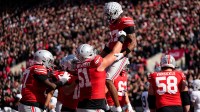 Ohio State Buckeyes wide receiver Carnell Tate (17) celebrates a touchdown with offensive lineman Luke Montgomery (51) during the NCAA football game against the Penn State Nittany Lions at Ohio Stadium in Columbus on Nov. 1, 2025.