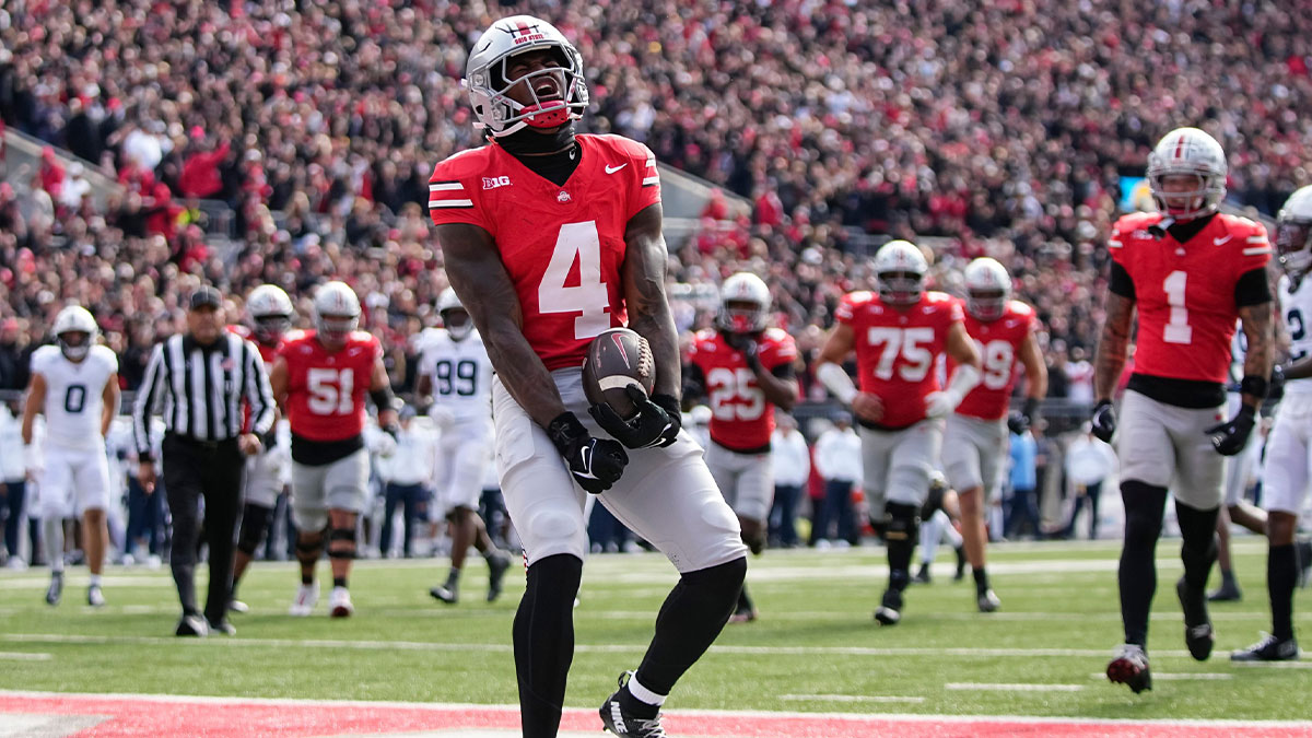 Ohio State Buckeyes wide receiver Jeremiah Smith (4) celebrates a touchdown during the NCAA football game against the Penn State Nittany Lions at Ohio Stadium