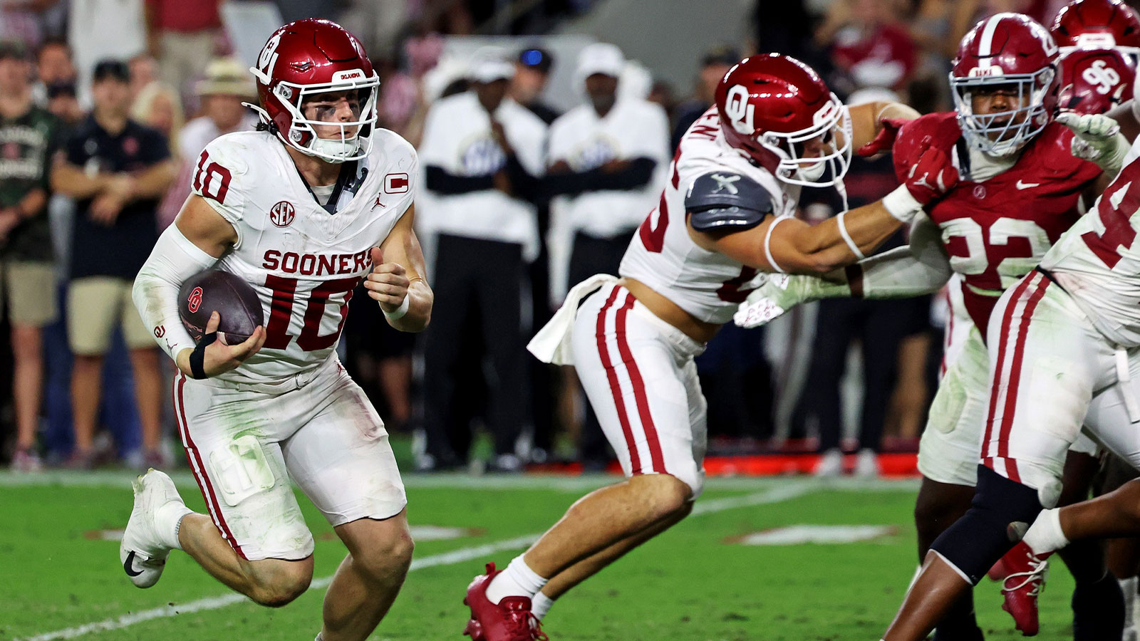 Oklahoma Sooners quarterback John Mateer (10) runs the ball during the fourth quarter against the Oklahoma Sooners at Saban Field at Bryant-Denny Stadium. 