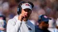 Ole Miss head coach Lane Kiffin walks off the field during a college football game between Mississippi State and Ole Miss at Davis Wade Stadium in Starkville, Miss.