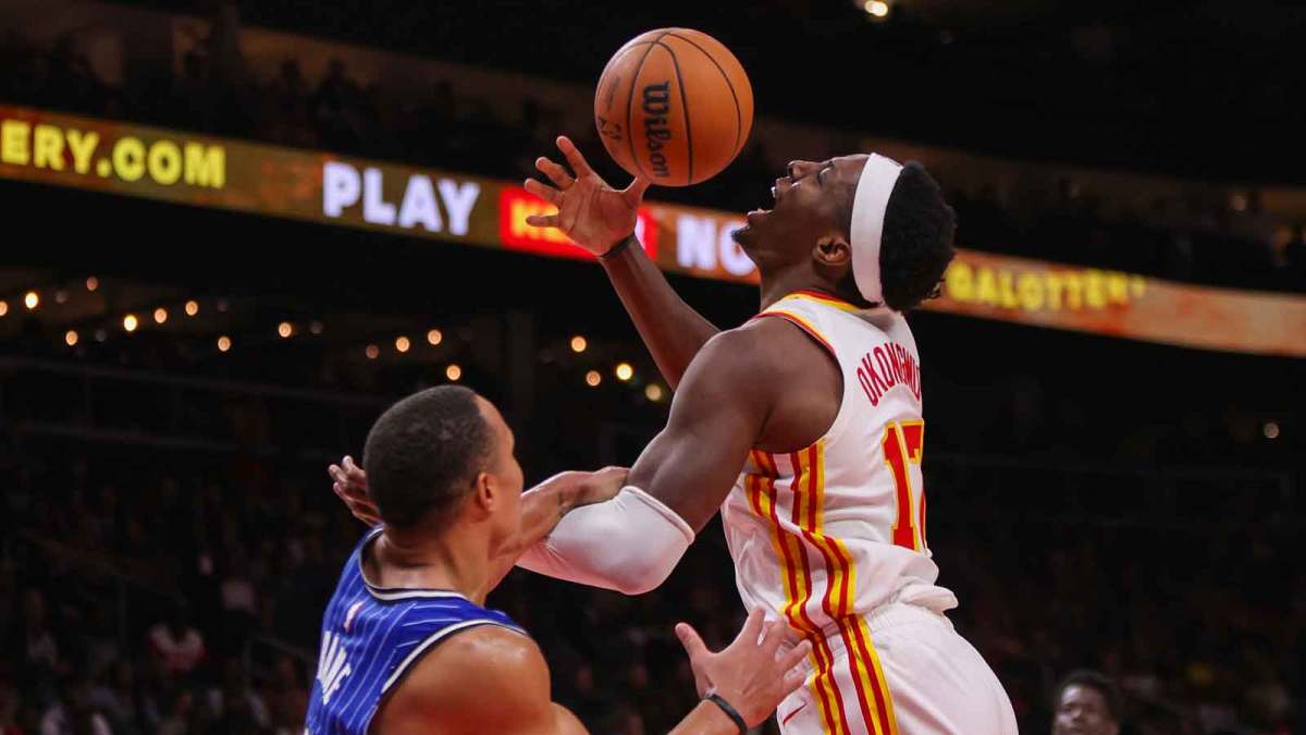 Orlando Magic guard Desmond Bane (3) fouls Atlanta Hawks forward Onyeka Okongwu (17) in the third quarter at State Farm Arena.
