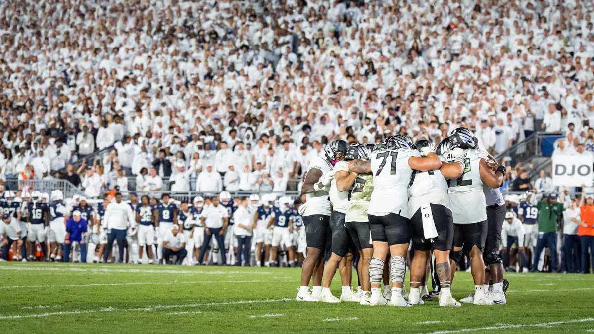 Oregon huddles up in overtime as the Oregon Ducks face the Penn State Nittany Lions on Sept. 27, 2025, at Beaver Stadium in University Park, Pennsylvania.