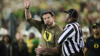 Oregon Ducks head coach Dan Lanning calls for a time out during the first half against the Minnesota Golden Gophers at Autzen Stadium.