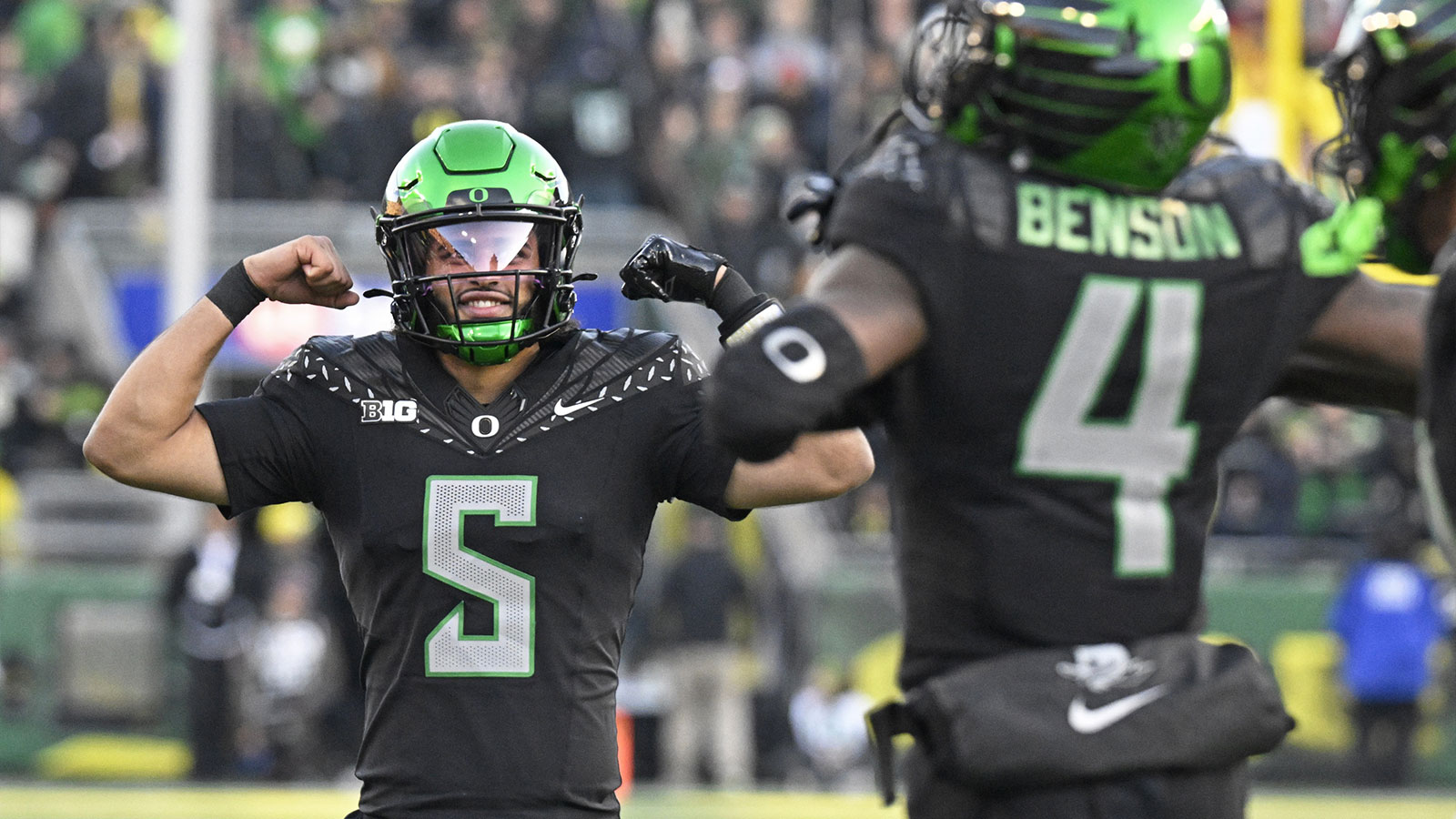 Oregon Ducks quarterback Dante Moore (5) celebrates after scoring a touchdown against the Southern California Trojans during the second half at Autzen Stadium.