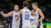 Orlando Magic guard Joe Ingles (7) leads a team huddle against the Charlotte Hornets in the second quarter at Amway Center.