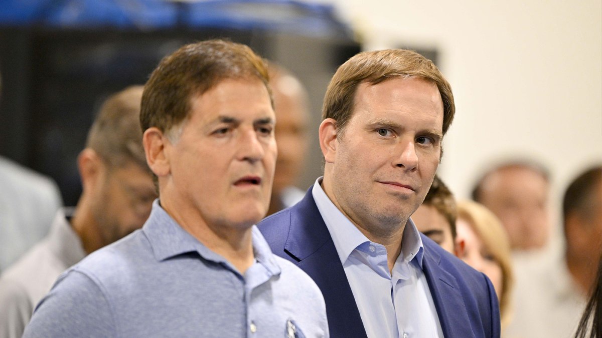 Dallas Mavericks minority owner Mark Cuban (left) and Mavericks governor Patrick Dumont (right) looks on a press conference at the Dallas Mavericks Practice Facility.