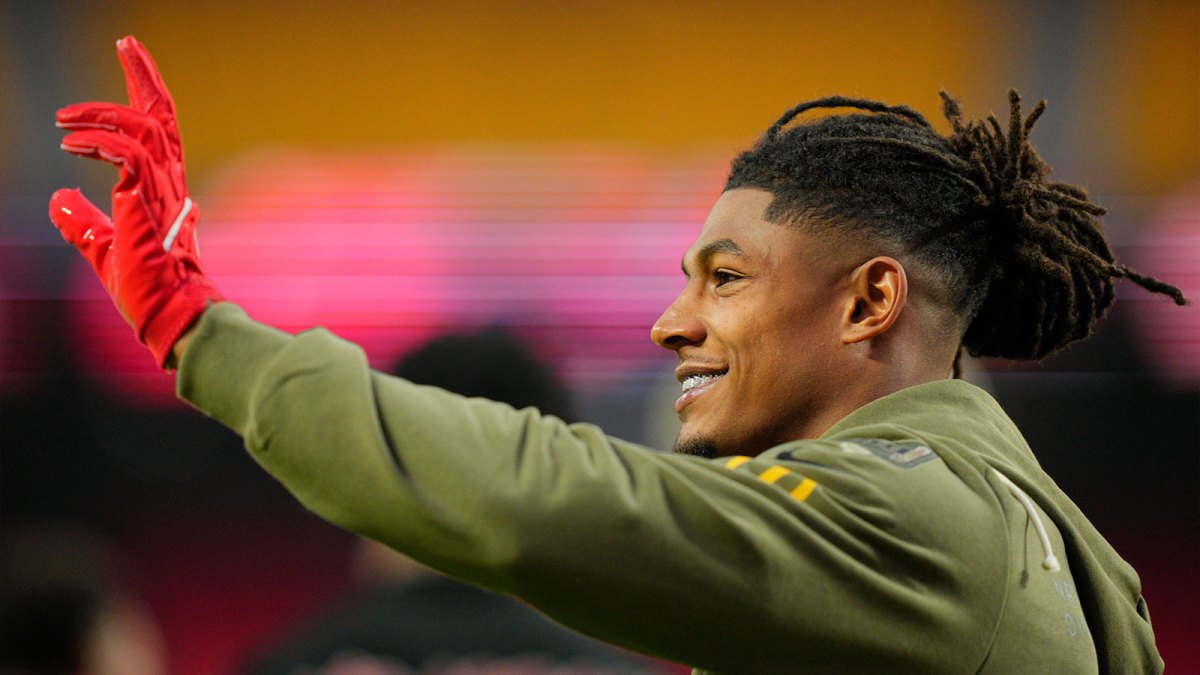 Kansas City Chiefs running back Isiah Pacheco (10) waves to fans during warmups prior to the game against the Washington Commanders at GEHA Field at Arrowhead Stadium.