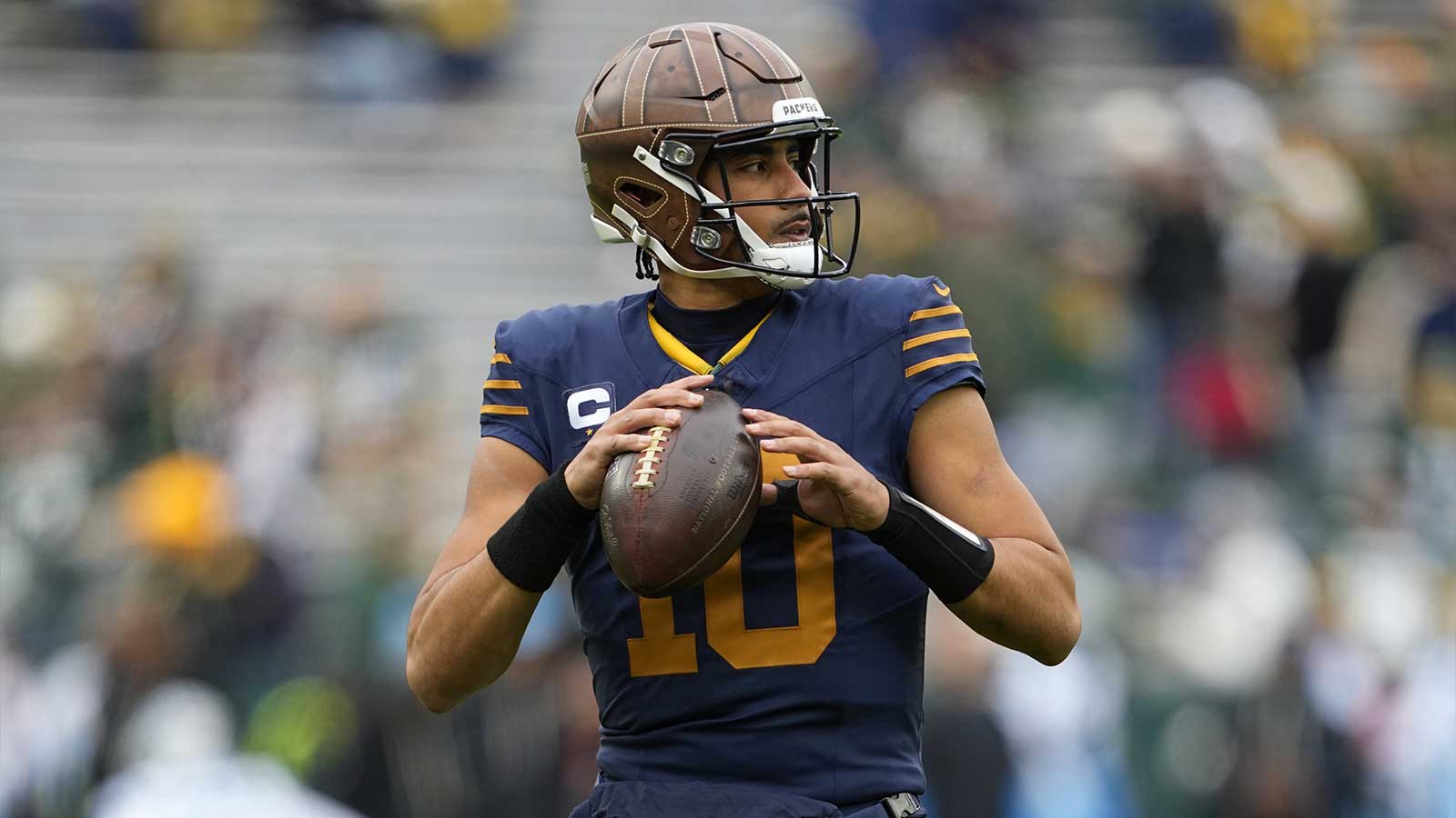 Green Bay Packers quarterback Jordan Love (10) warms up before a game against the Carolina Panthers at Lambeau Field.