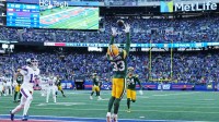 Green Bay Packers safety Evan Williams (33) makes interception during the fourth quarter against the New York Giants at MetLife Stadium.