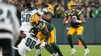 Green Bay Packers quarterback Jordan Love (10) stands in the pocket against the Philadelphia Eagles in the first half at Lambeau Field.