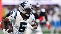Carolina Panthers running back Rico Dowdle (5) runs with the ball in the third quarter against the Carolina Panthers at Mercedes-Benz Stadium.