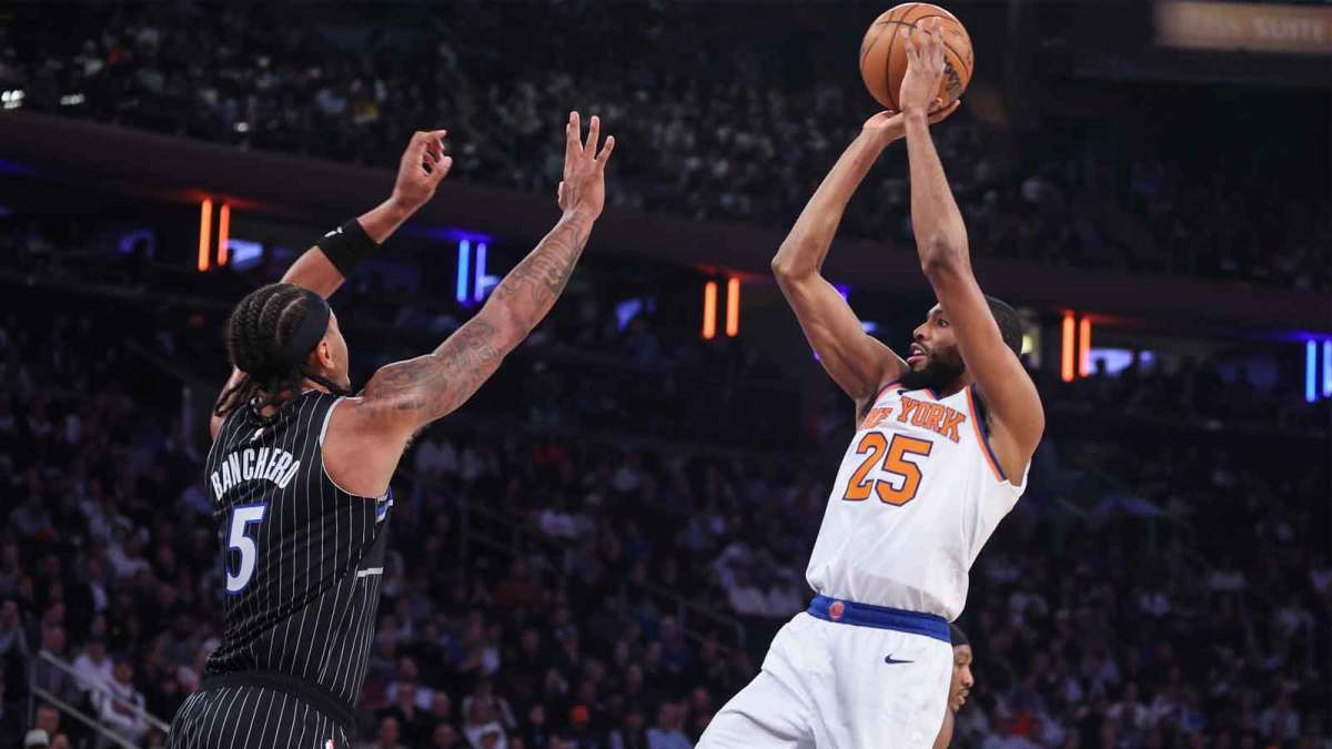 New York Knicks guard Mikal Bridges (25) takes a jump shot past Orlando Magic forward Paolo Banchero (5) in the first quarter at Madison Square Garden.