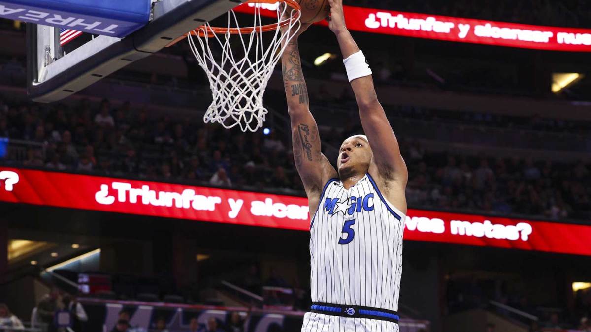 Orlando Magic forward Paolo Banchero (5) dunks the ball against the Portland Trail Blazers in the third quarter at Kia Center.