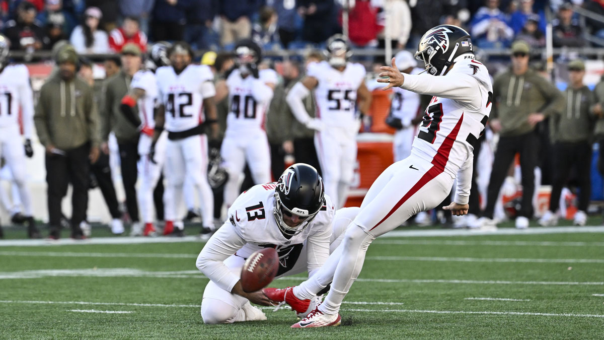 Atlanta Falcons place kicker Parker Romo (39) kicks a point after try against the New England Patriots during the first half at Gillette Stadium.