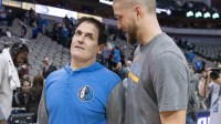 Dallas Mavericks owner Mark Cuban (left) talks with his former player Memphis Grizzlies forward Chandler Parsons (right) after the game at the American Airlines Center. The Grizzlies defeat the Mavericks 80-64.