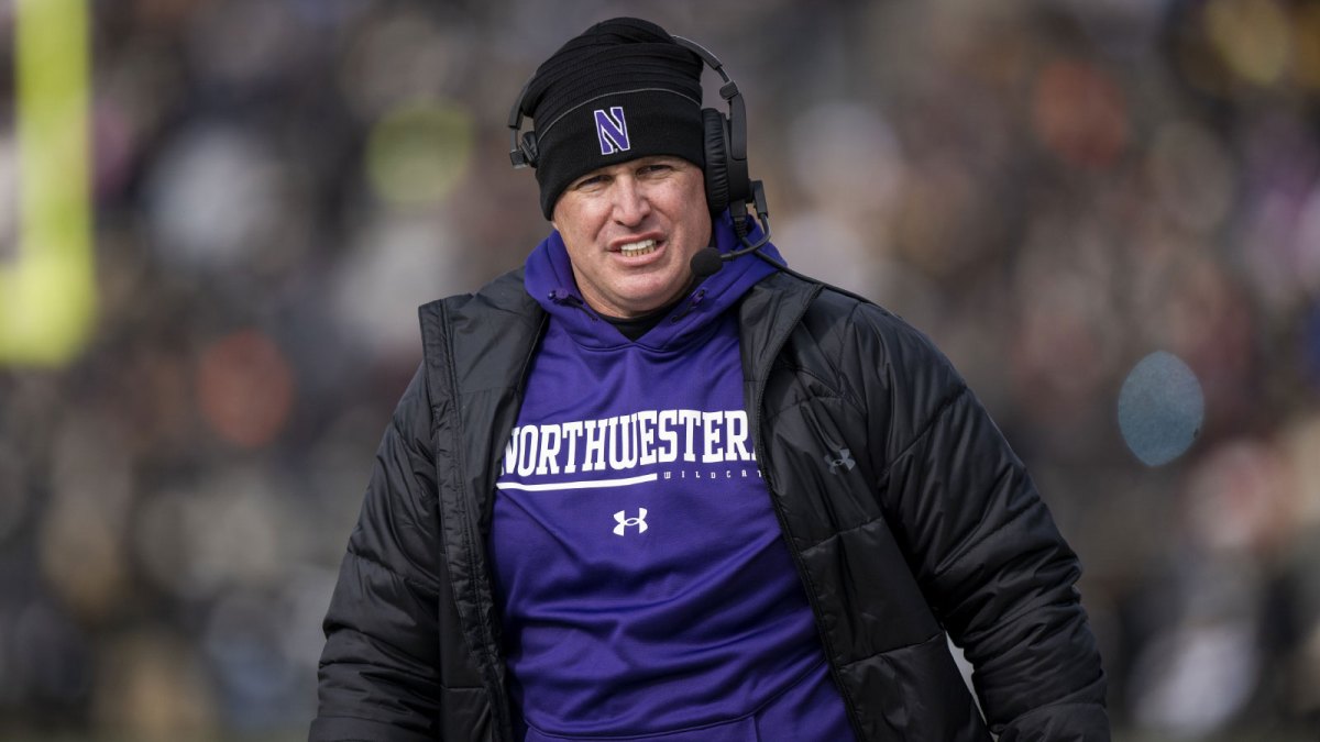 Northwestern Wildcats head coach Pat Fitzgerald walks the sidelines during the second quarter against the Purdue Boilermakers at Ross-Ade Stadium.