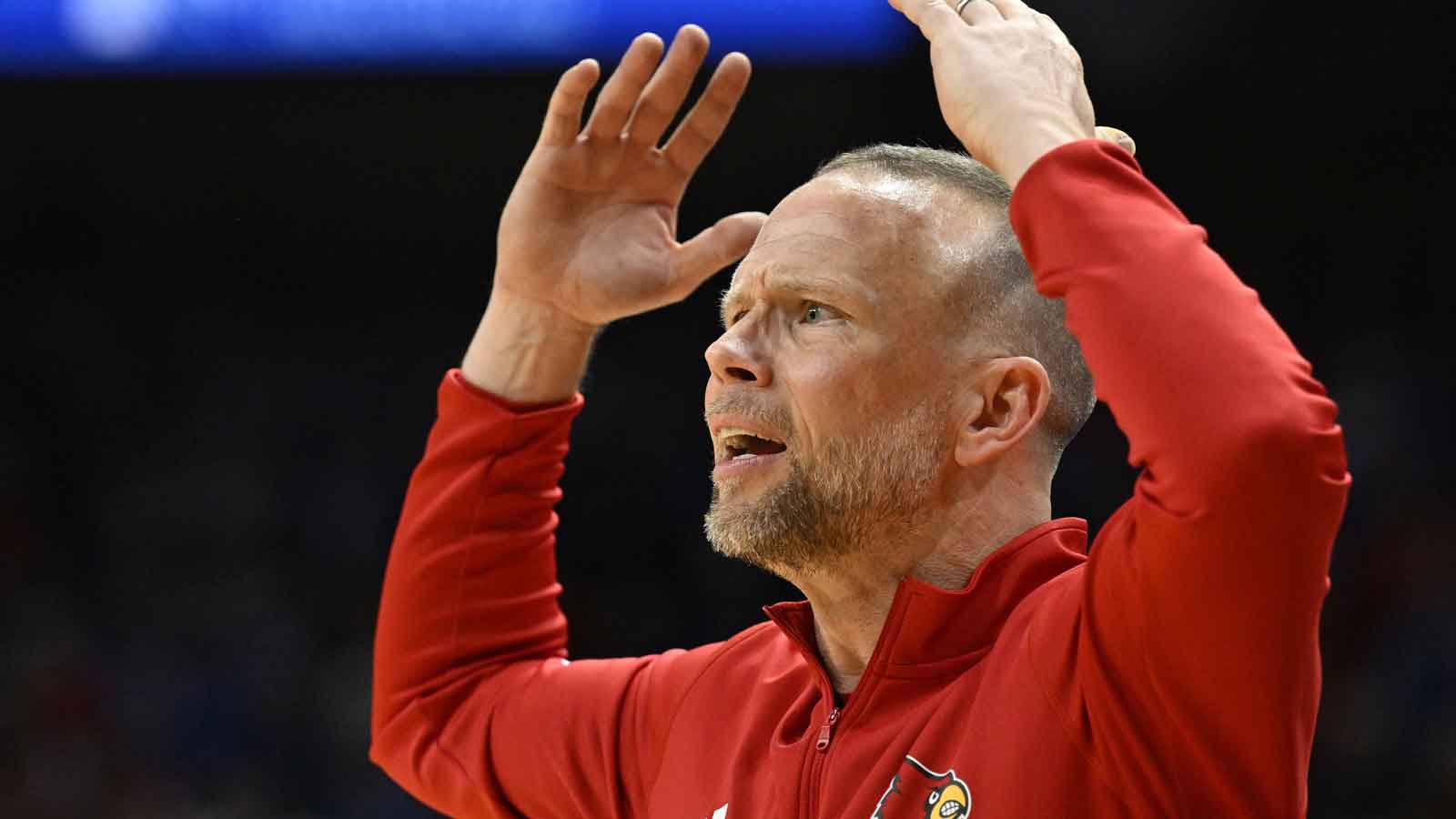 Louisville HC Pat Kelsey suffers bizarre injury during celebration after beating Kentucky