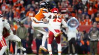 Denver Broncos cornerback Ja'Quan McMillian (29) sacks Kansas City Chiefs quarterback Patrick Mahomes (15) in the fourth quarter at Empower Field at Mile High.