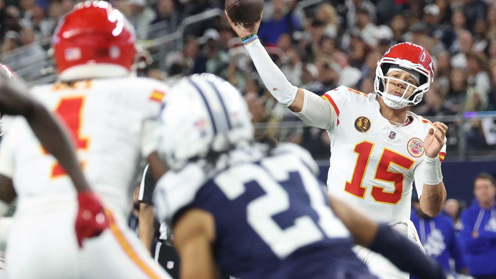Kansas City Chiefs quarterback Patrick Mahomes (15) throws a pass against the Dallas Cowboys during the fourth quarter at AT&T Stadium. 