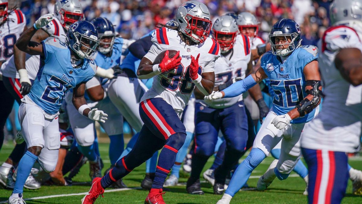New England Patriots running back Rhamondre Stevenson (38) runs in a touchdown against the Tennessee Titans during the third quarter at Nissan Stadium in Nashville, Tenn., Sunday, Oct. 19, 2025.