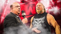WWE stars Paul Heyman and Brock Lesnar with Monday Night RAW behind them.