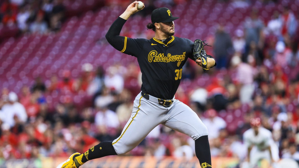 Pittsburgh Pirates starting pitcher Paul Skenes (30) pitches against the Cincinnati Reds in the first inning at Great American Ball Park