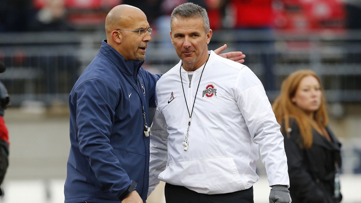 Penn State Nittany Lions head coach James Franklin (left) and Ohio State Buckeyes head coach Urban Meyer greet before the game at Ohio Stadium.